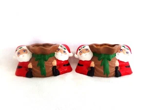 2 SOPORTES CANDELABROS NAVIDAD VINTAGE DOBLE CERÁMICA SANTA CON BOLSA DE JUGUETE - Imagen 1 de 3