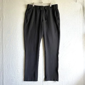 Pantalones Lululemon para mujer 10 negros sobre la marcha tejidos bolsillos de pierna ancha cintura elástica - Imagen 1 de 9