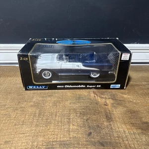 Coche fundido a presión Welly 1955 Oldsmobile Super 88 convertible 1:18 azul/blanco 🚗 - Imagen 1 de 6