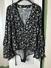Free People Women?s Size L Shes Dainty Bell Sleeves Black Floral Print Bodysuit