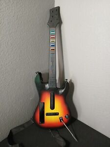 Redoctane Sunburst Guitar for the Wii (95455.805) Includes strap.  No cover.