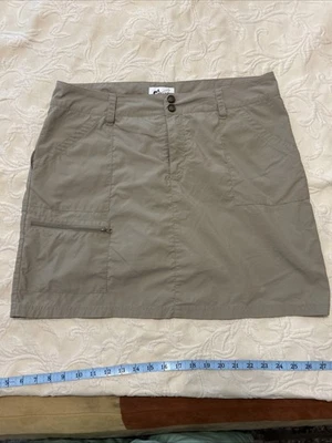 Falda corta World Wide Sportsman para mujer de nailon beige tostado talla 12 bolsillos cremalleras Foto 1 de 4