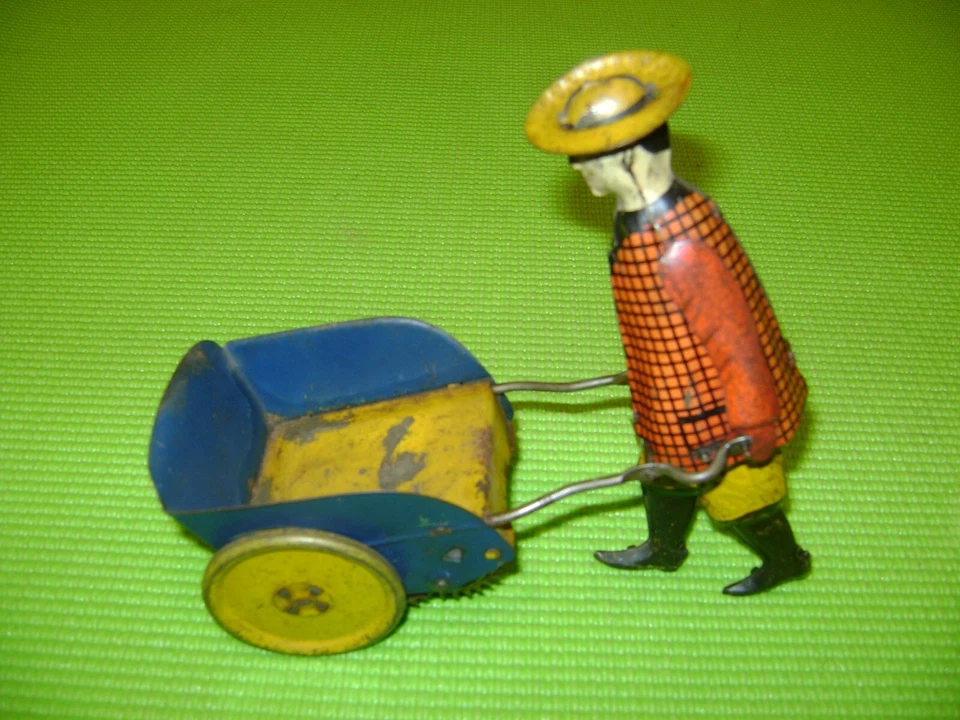 JOUET MECANIQUE ANCIEN JARDINIER AVEC BROUETTE  EN TOLE-GERMANY-EPOQUE LEHMANN - Photo 1/4