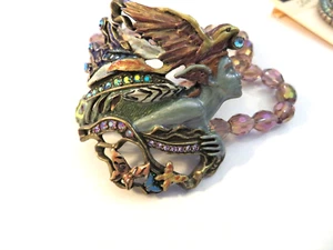 PULSERA ELÁSTICA KIRKS FOLLY JOSEPHINE WALL SPIRIT OF FLIGHT NUEVA CON ETIQUETAS PROMEDIO - Imagen 1 de 2