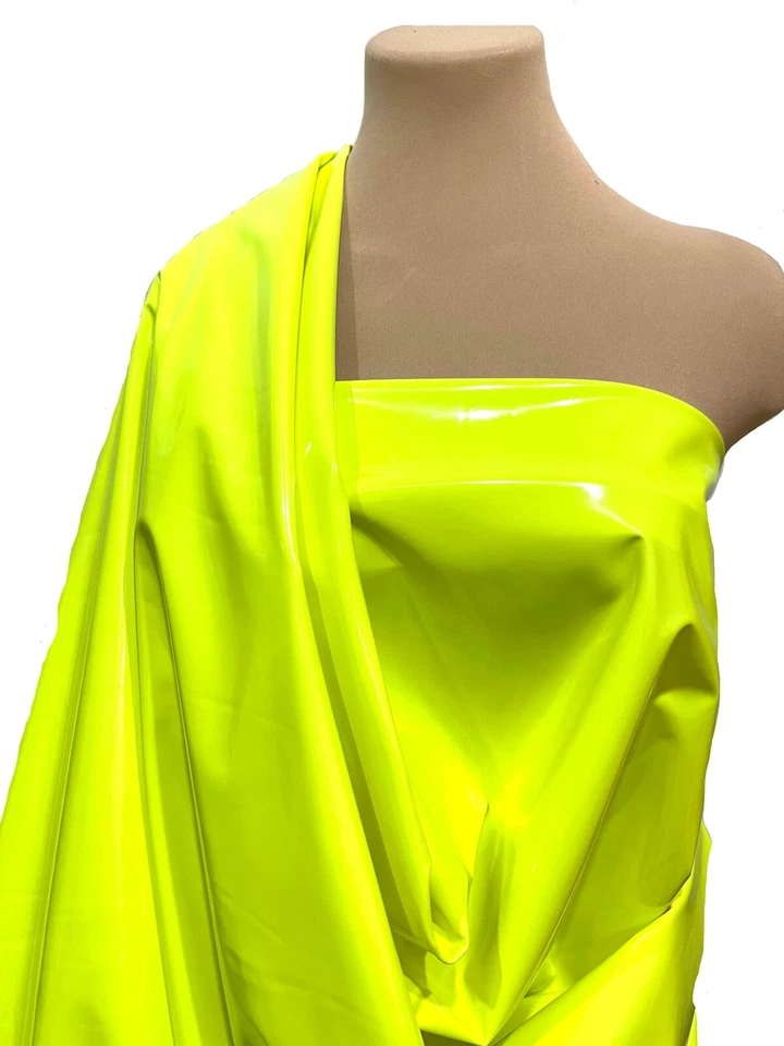 4 WAY STRETCH PU COATED FLUORESCENT YELLOW  FABRIC... 58 " WIDE.. SOLD BTY  - Image 1 of 1