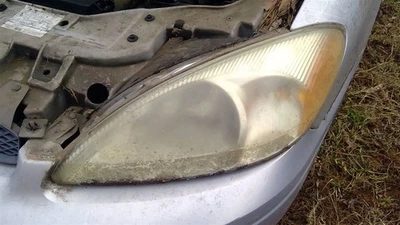 Driver Left Headlight Fits 00-07 Ford Taurus OEM - Image 1 of 4