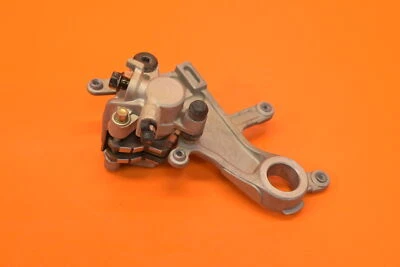 COLGADOR DE PINZA DE FRENO TRASERO HONDA CRF250R CRF250X CRF450R CRF450X OEM NISIN Foto 1 de 4