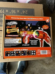 NIB Star Shower Slide Show Light Projector Halloween With Remote - Picture 1 of 3