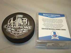 Disco de hockey Beckett Beckett Jake Muzzin Firmado por los Kings 2014 Stanley Cup Champs Bajo certificado de autenticidad 1A - Imagen 1 de 3