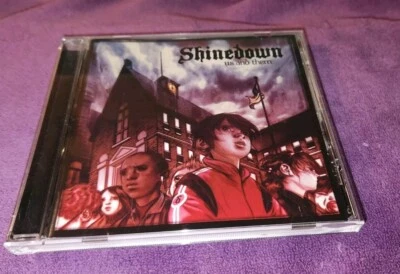 SHINEDOWN cd US AND THEM Foto 1 de 4