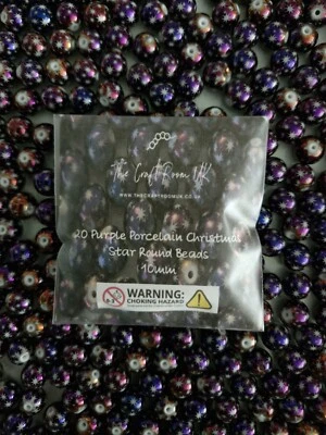 PURPLE PORCELAIN CHRISTMAS STAR ROUND BEADS 10MM JEWELLERY FREE POSTAGE - Image 1 of 4