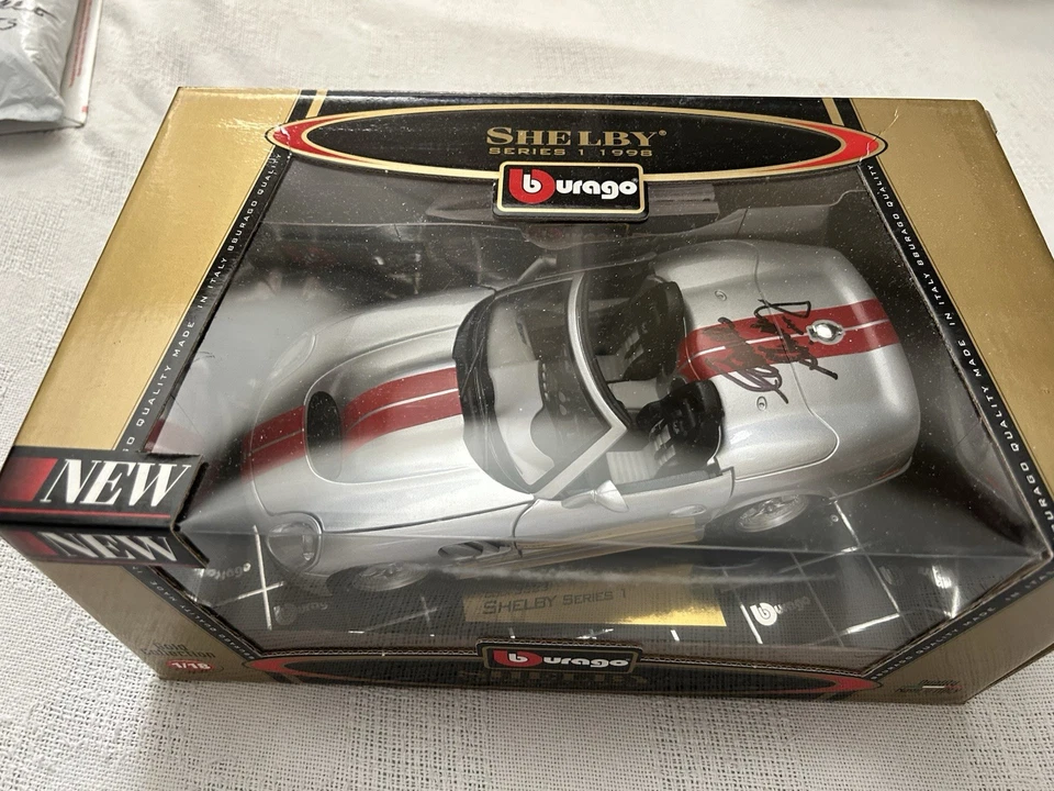 REDUCIDO: 1998 Shelby Serie 1 Firmado por Carroll Shelby Die Cast 1:18 Burago Nuevo en Caja Foto 1 de 4