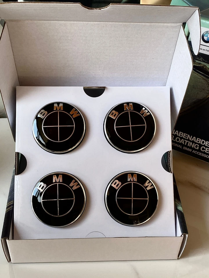 Nuevo juego de 4 tapas centrales de rueda de coche giratorias negras BMW 56 mm Foto 1 de 4