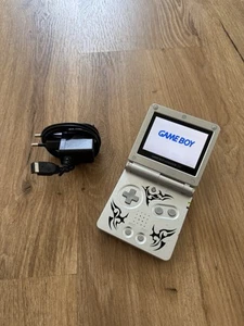 Gameboy Advance SP 101 GBA Tribal Version - Bild 1 von 4