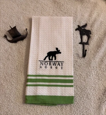 GANCHO PARA TOALLAS DE ALCE DE HIERRO FUNDIDO NORUEGA CON TOALLA DE COCINA Y FIGURA DE BARCO VIKINGO. DECORACIÓN Foto 1 de 4