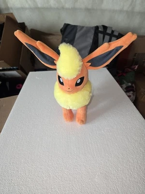 Raro 2014 Eveelution Pokémon Center Flareon Foto 1 de 3