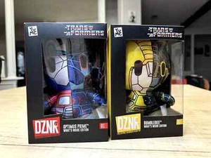 Transformers DZNR Set Optimus Prime & Bumblebee Plush What’s Inside Edition - Picture 1 of 4