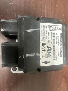 FORD FUSION SRS CONTROL MODULE UNIT(P) PN: ES7T 14B321 AA - Picture 1 of 3