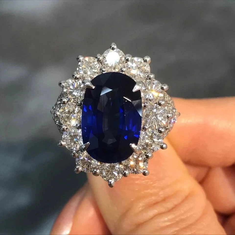 Alianza de diamantes de zafiro natural de corte ovalado de 12,35 quilates de oro blanco macizo de 14 quilates 5 6 Foto 1 de 4