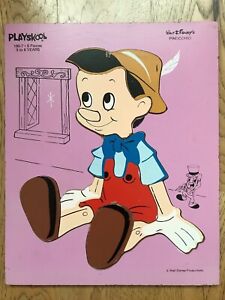 Vintage Playskool wood puzzle 190-7 Disney's Pinocchio 8 Pieces Pink Background 