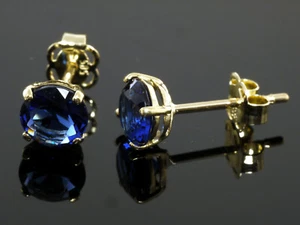 585 Gold Ohrstecker 1 Paar 5,7 mm Grösse 4 Krappen Zirkonia Steine - Bild 1 von 2