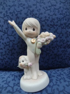 Enesco Precious Moments Figurine. " GOD BLESS YOU WITH BOUQUETS OF VICTORY" - Picture 1 of 7