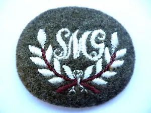 UNIFORME DE VESTIR DE TIRADORES DE AMETRALLADORA DEL EJÉRCITO BRITÁNICO INSIGNIA COMERCIAL NO2. - Imagen 1 de 1
