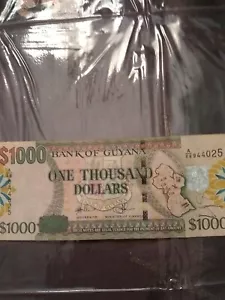 Guyana $1000 Bill, in good condition. A944025 - Picture 1 of 2