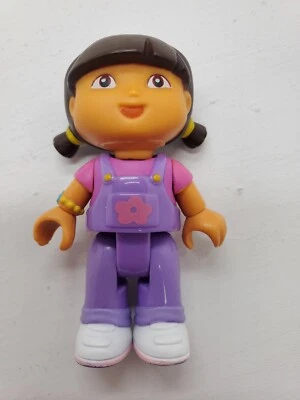 Mega Bloks Dora the Explorer Building Figure 2.75" Tall Purple bibs pink shirt  - Image 1 of 4