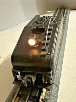 LIONEL O GAUGE 2403B SLOPE BELL TENDER WORKS AND BACK LIGHT - Image 1 of 4