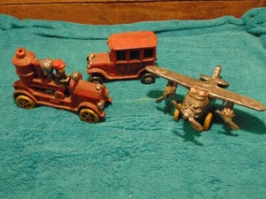 STORAGE LOCKER FIND Cast Iron Airplane, Fire truck, and a Truck - Picture 1 of 9