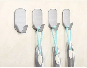 Piccoli ganci appiccicosi per appendere ganci autoadesivi extra resistenti resistenti resistenti resistenti - Foto 1 di 10
