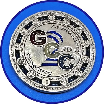 Geocoin 2005 - 2007 GCC Anniversary Coin w/ Geocaching Catch Phrases Unactivated - Image 1 of 2