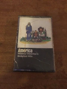 AMERICA- HISTORY / AMERICA'S GREATEST HITS- CASSETTE- M5 3110 - Foto 1 di 4