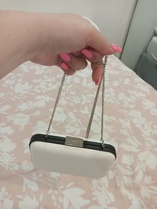 Olga Berg White with Black Trim Clutch with Detachable Silver Chain Strap - Picture 1 of 13