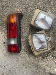 Mercedes W201 indicator & rear driver side lamp 190E 190D O/s N/s - Picture 1 of 4
