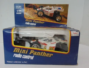 Auto vintage Nikko America scala 1/24 mini pantera radiocomando NON TESTATA - Foto 1 di 9