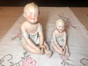 Lot of 2 Vintage Gerbruder Heubach Bisque Piano Baby Figurines. - Picture 1 of 12