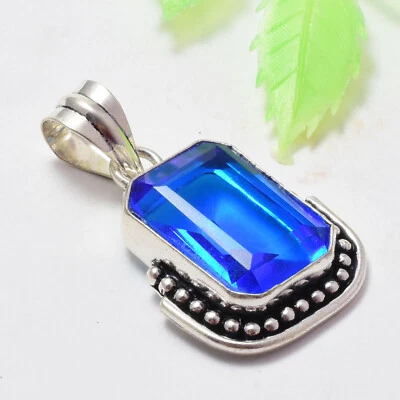 Colgante hecho a mano de plata de ley 925 con piedras preciosas de topacio azul de Londres Foto 1 de 4