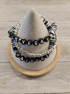 ¡Cualquier equipo! Juego de pulseras apilables Las Vegas Raiders - Imagen 1 de 2