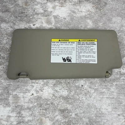 Nissan Rogue 2008-2013 lado derecho del pasajero parasol bronceado iluminado probado Foto 1 de 4