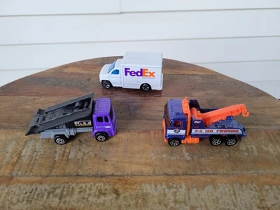 FEDEX Matchbox 1998, Hot Wheels Tow Truck 1981, & Maisto Tonka Tow Ramp Truck - Image 1 of 4