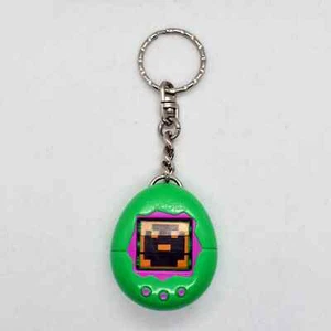 Vintage 1997 Tamagotchi McDonald's Windup Toy Keychain Green Happy Meal Toy 0123 - Picture 1 of 3