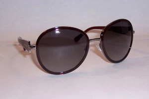 NUEVAS GAFAS DE SOL PRADA SPR 51N 5AV-3M1 PISTOLA/GRIS 51NS AUTÉNTICAS - Imagen 1 de 9