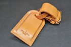 Vintage genuine Louis Vuitton leather luggage tag and poignet