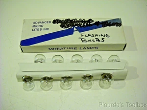Box of (10) NOS Advanced Micro AML-67 Single Contact Bayonet Miniature Lamps - Picture 1 of 3