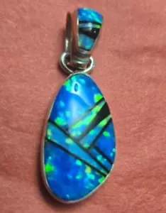 Sheryl Martinez? ¿Ópalo multicolor de ley? Colgante 1 1/4 x 1/2" 3 gramos - Imagen 1 de 8