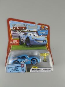Disney Pixar Cars World of Cars Dinoco Lightning McQueen w/ Piston Cup CHASE D23
