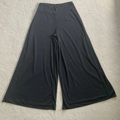 Pantalones de vestir negros estilo palazzo para mujer de Cb Est. Talla mediana 1962 usada en excelente estado Foto 1 de 4