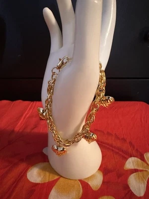 Pulsera para mujer chapada en oro con 5 dijes en plata 925 Foto 1 de 2